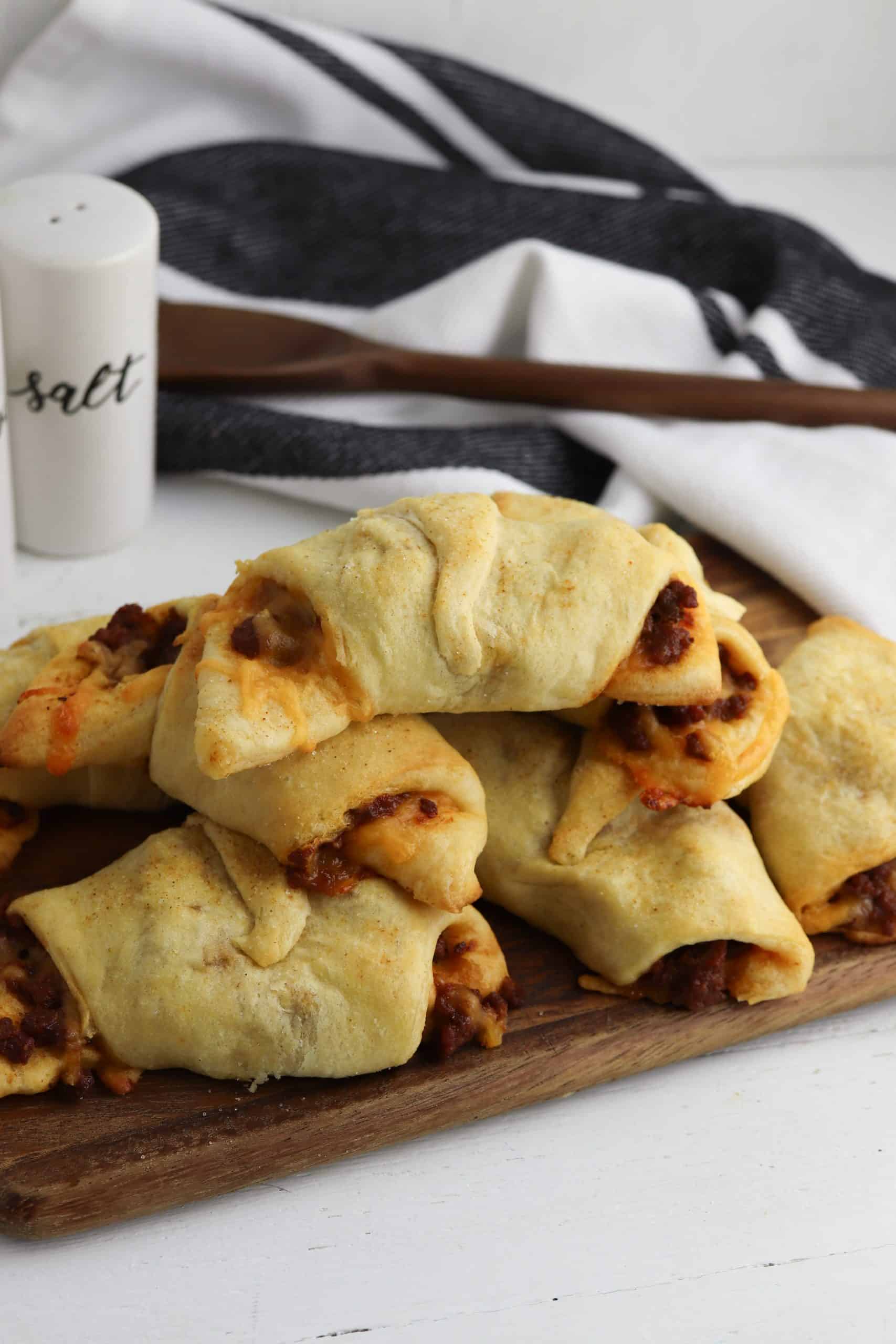 Crescent Roll Sloppy Joes on a cutting board.
