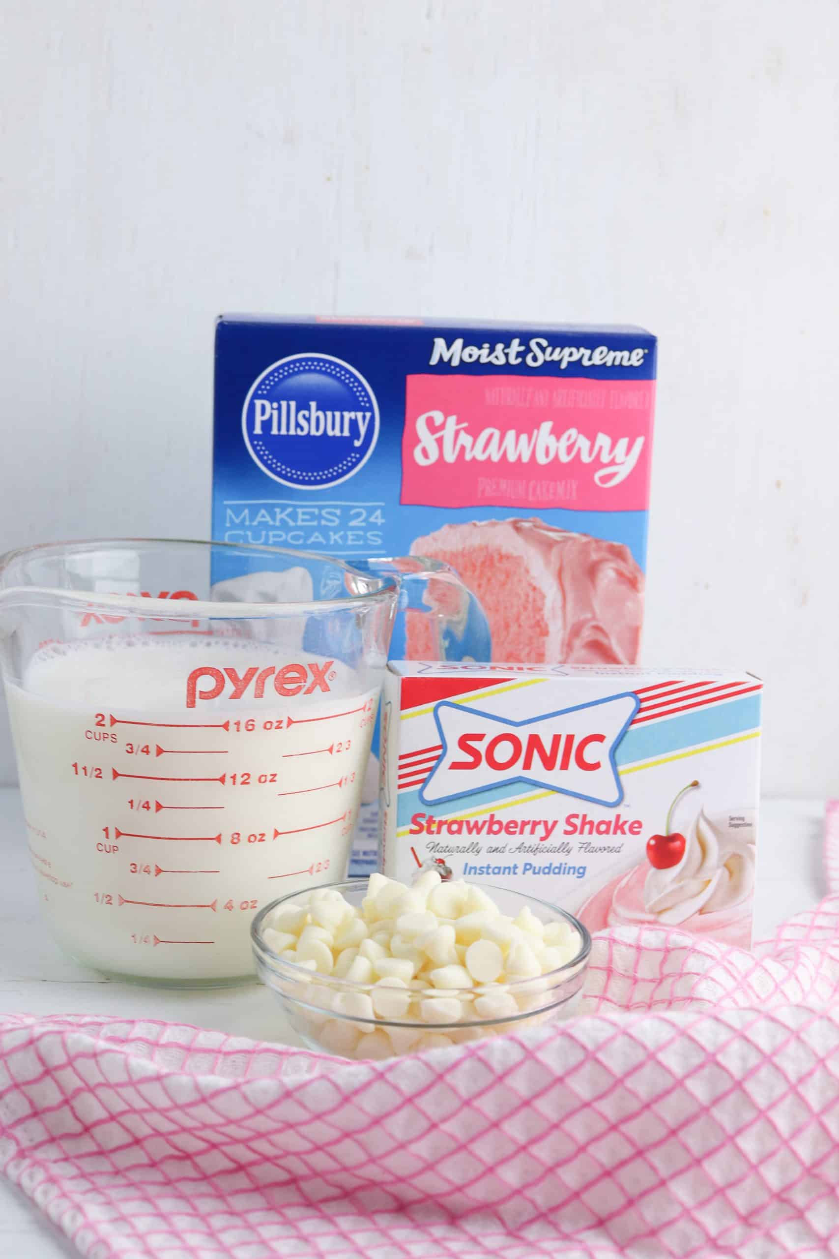 Ingredients for Strawberry Brownies made with pudding and cake mix.