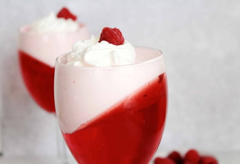 head-on photo of strawberry jello parfaits.