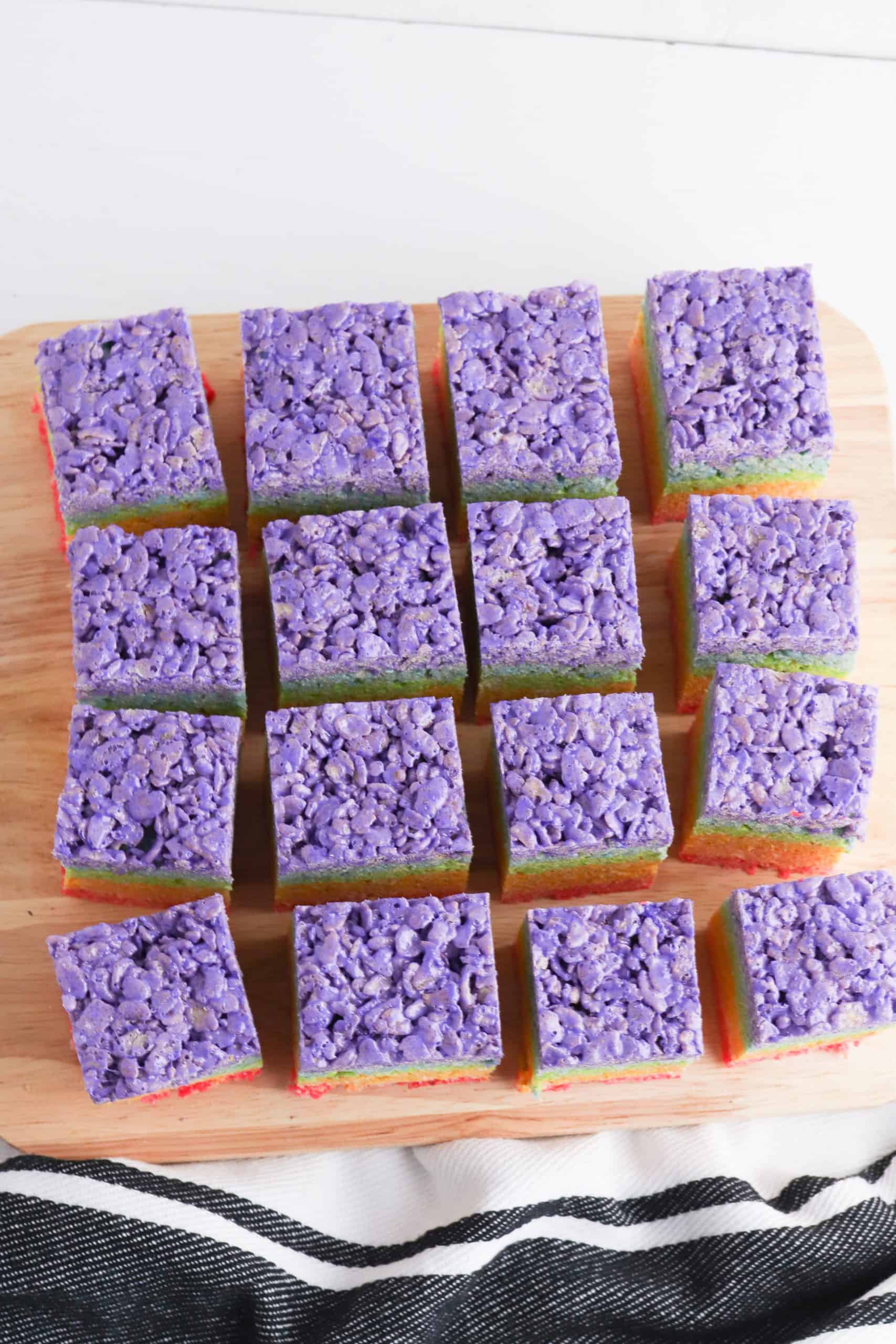 Overhead view of rice krispies treats showing the purple tops.