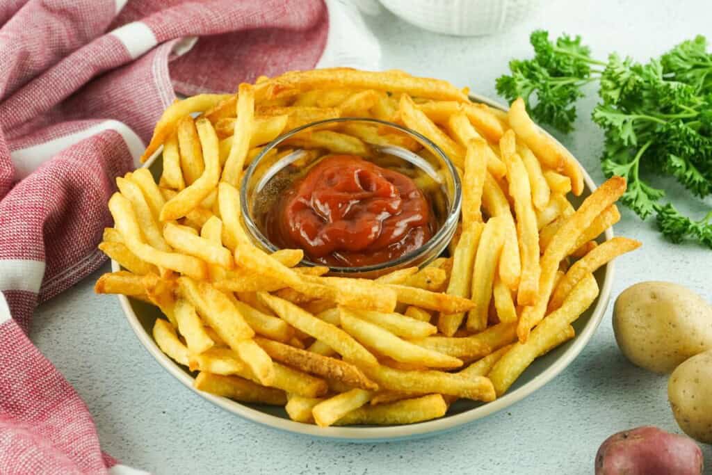 air fryer French fries with ketchup.