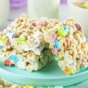Lucky Charms Treats on a light teal plate.