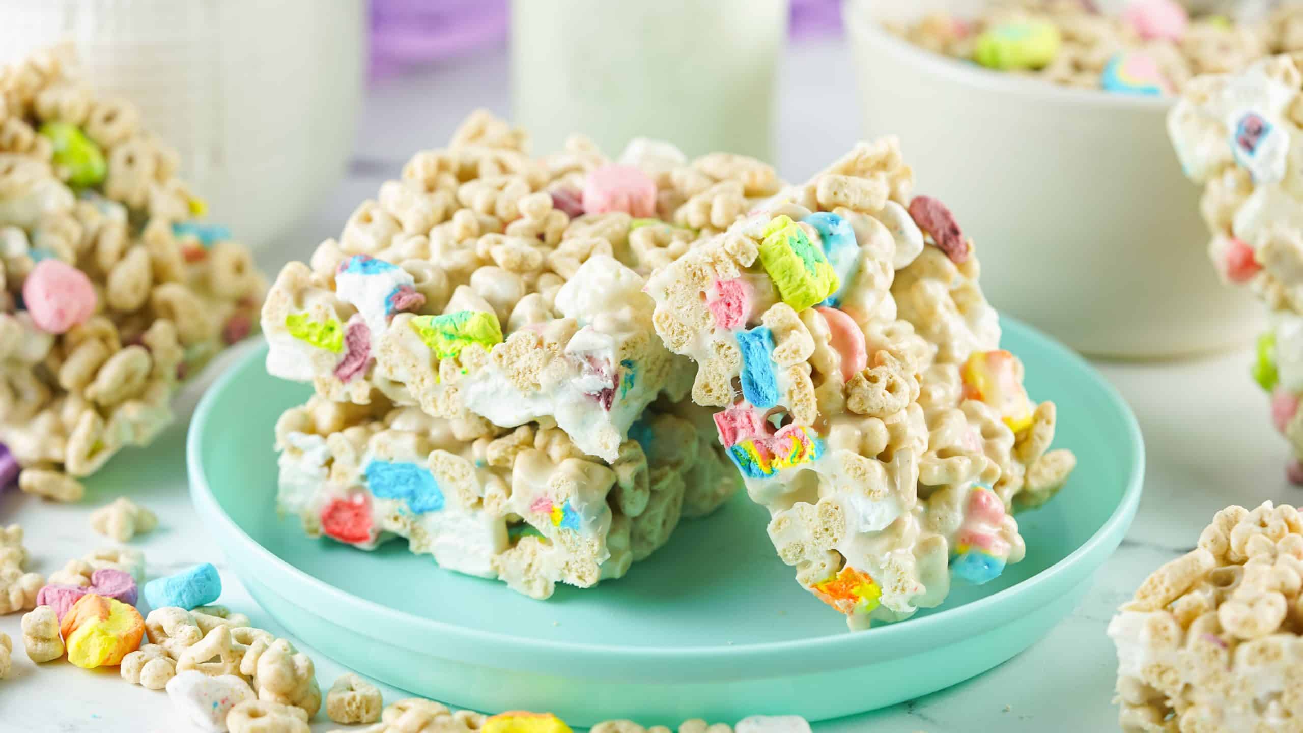 Lucky Charms Treats on a light teal plate.