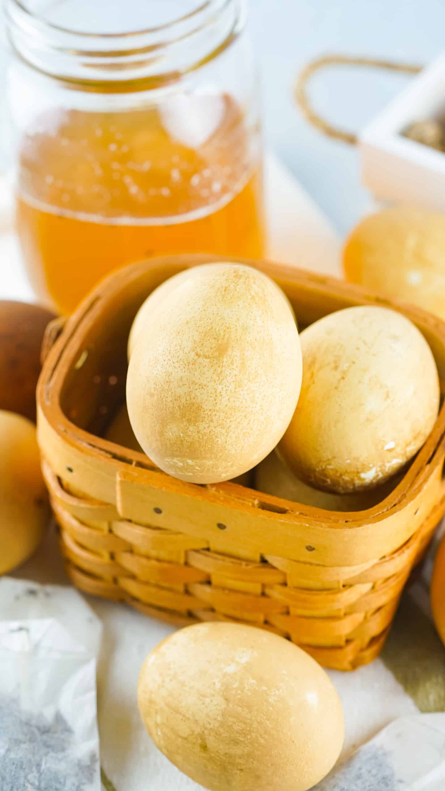 Black tea dyed eggs in a basket.