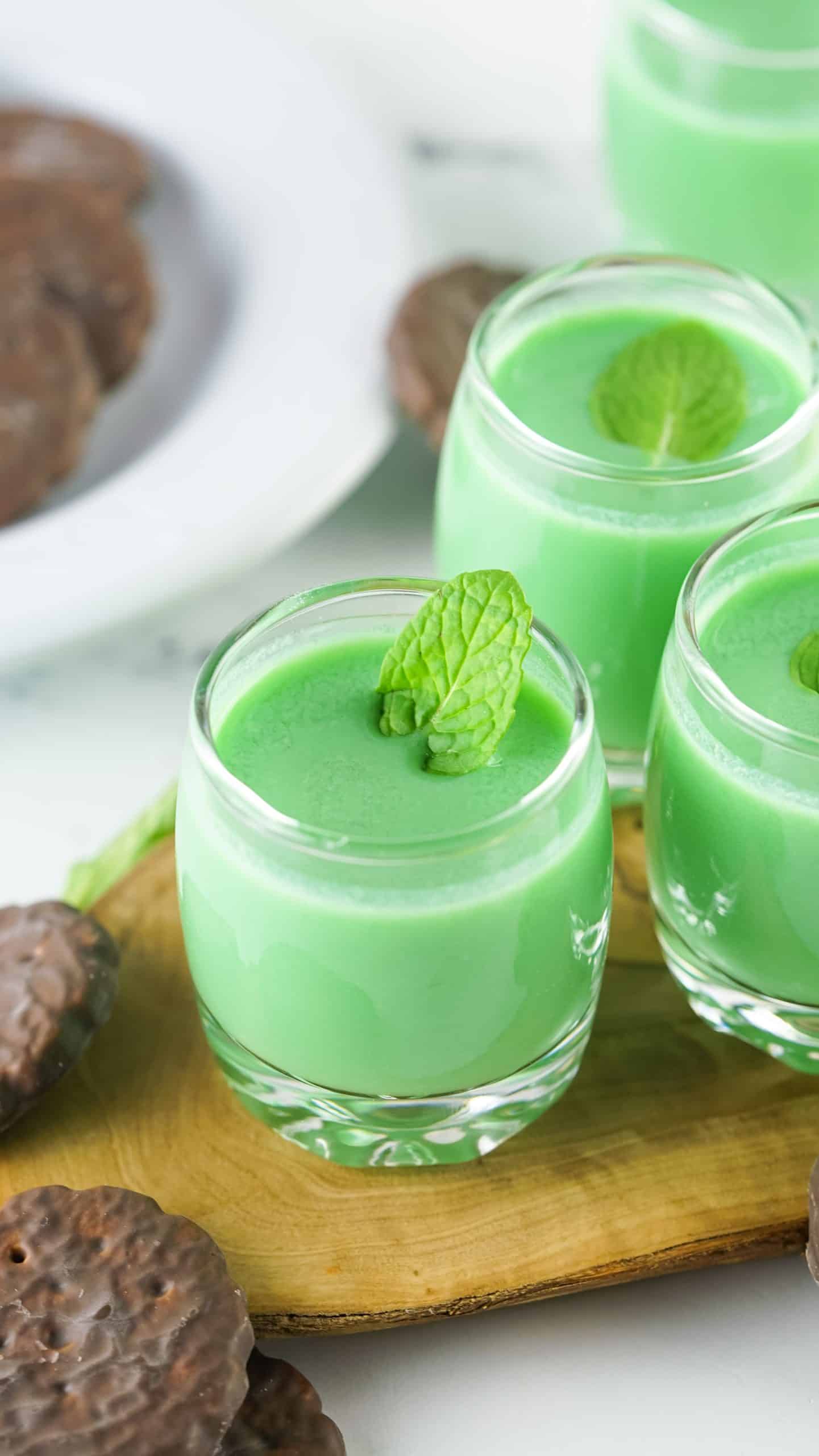 Green shots with mint leaves on top.