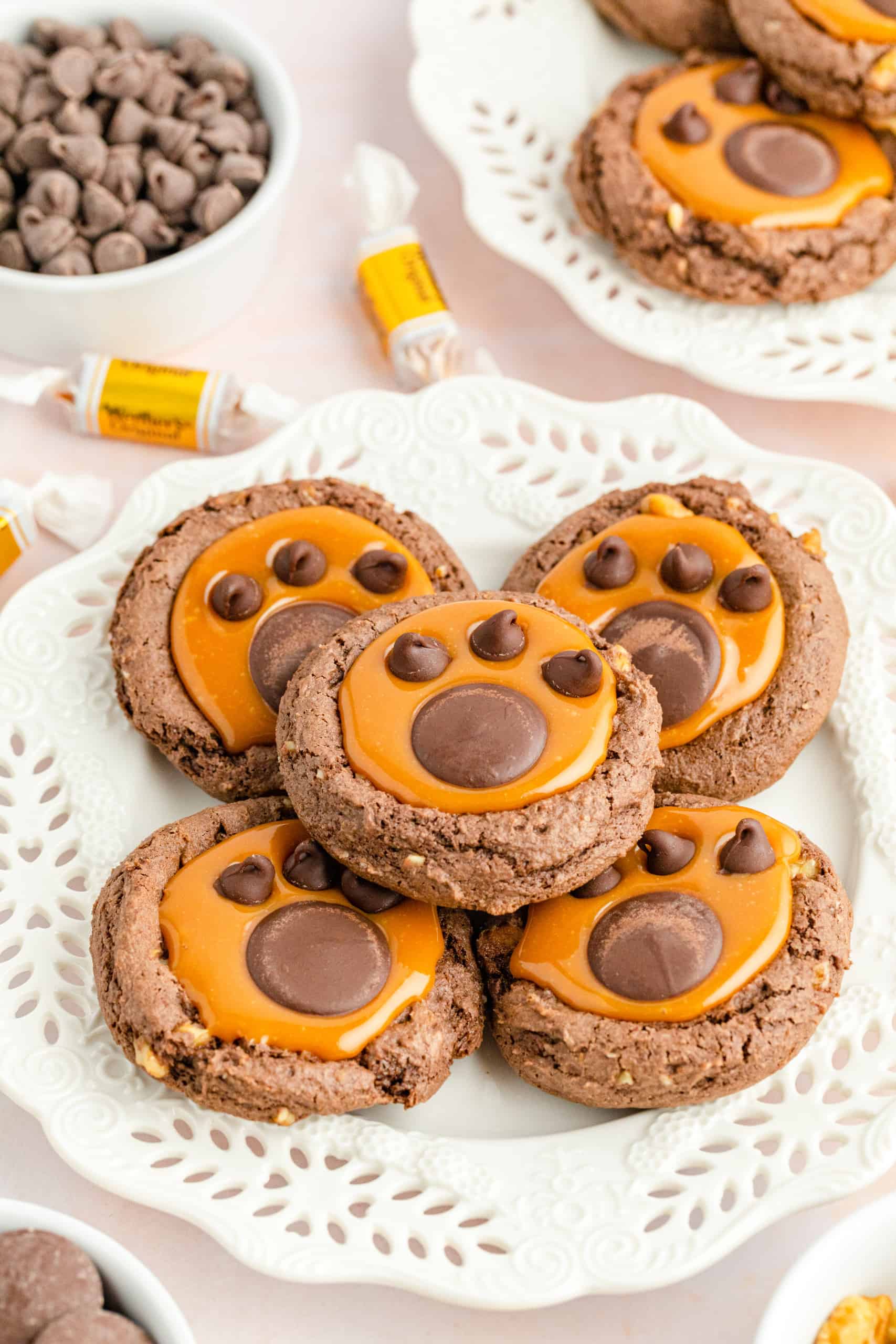 Bear paw cookies on a white plate.