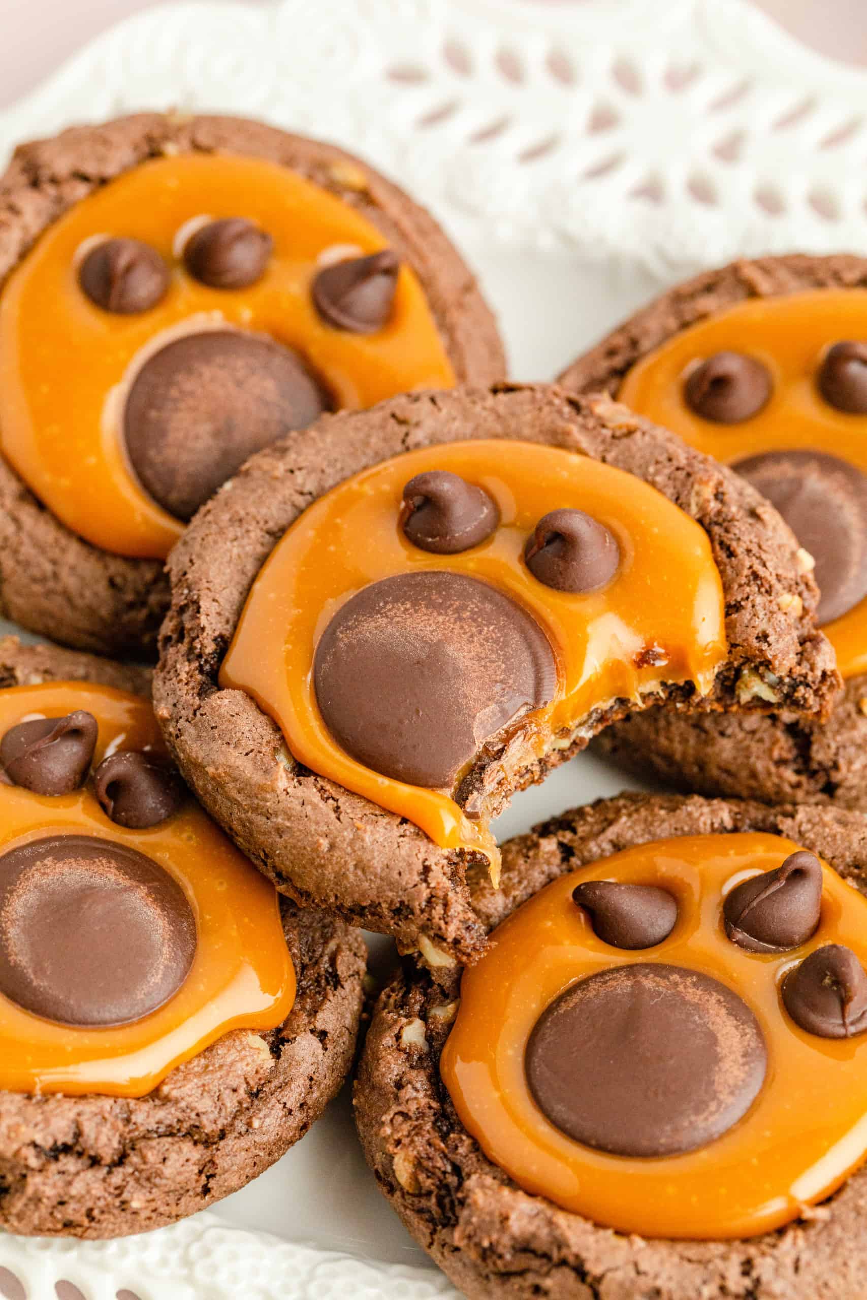 Closeup of chocolate caramel bear paw cookies.
