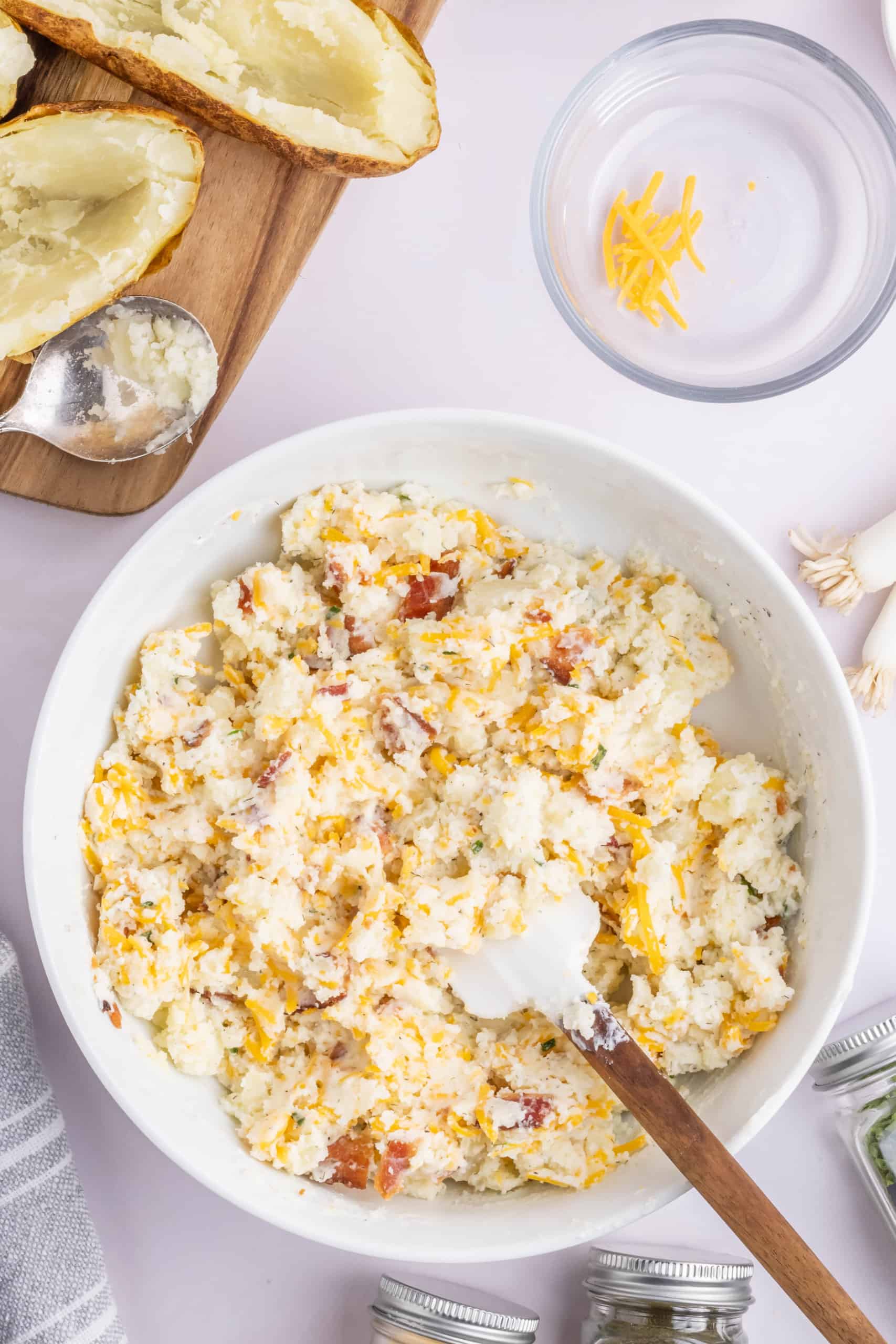 Twice Baked Potatoe filling in a white ceramic bowl.