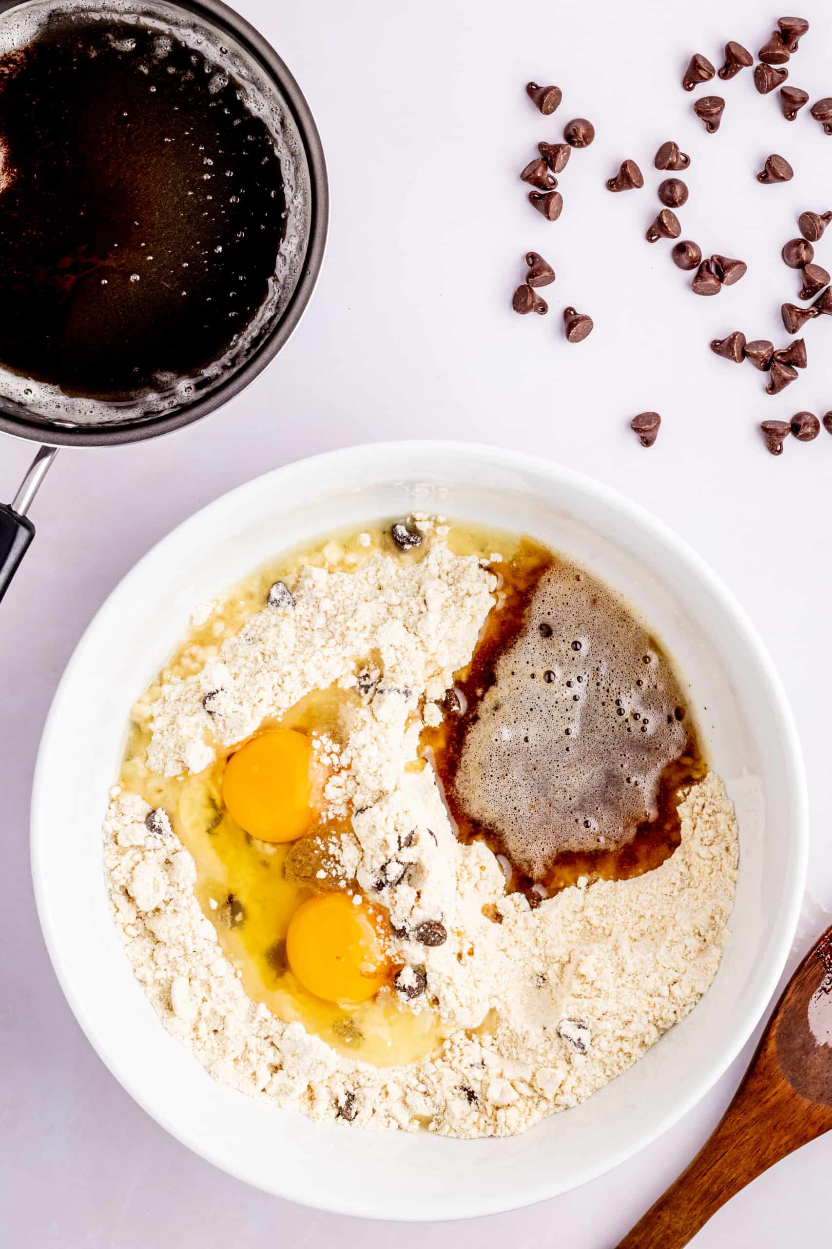 Mixing cookie dough with brown butter.