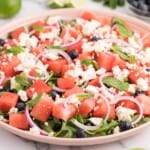 Watermelon Blueberry and FEta Salad with red onions and lime vinaigrette.