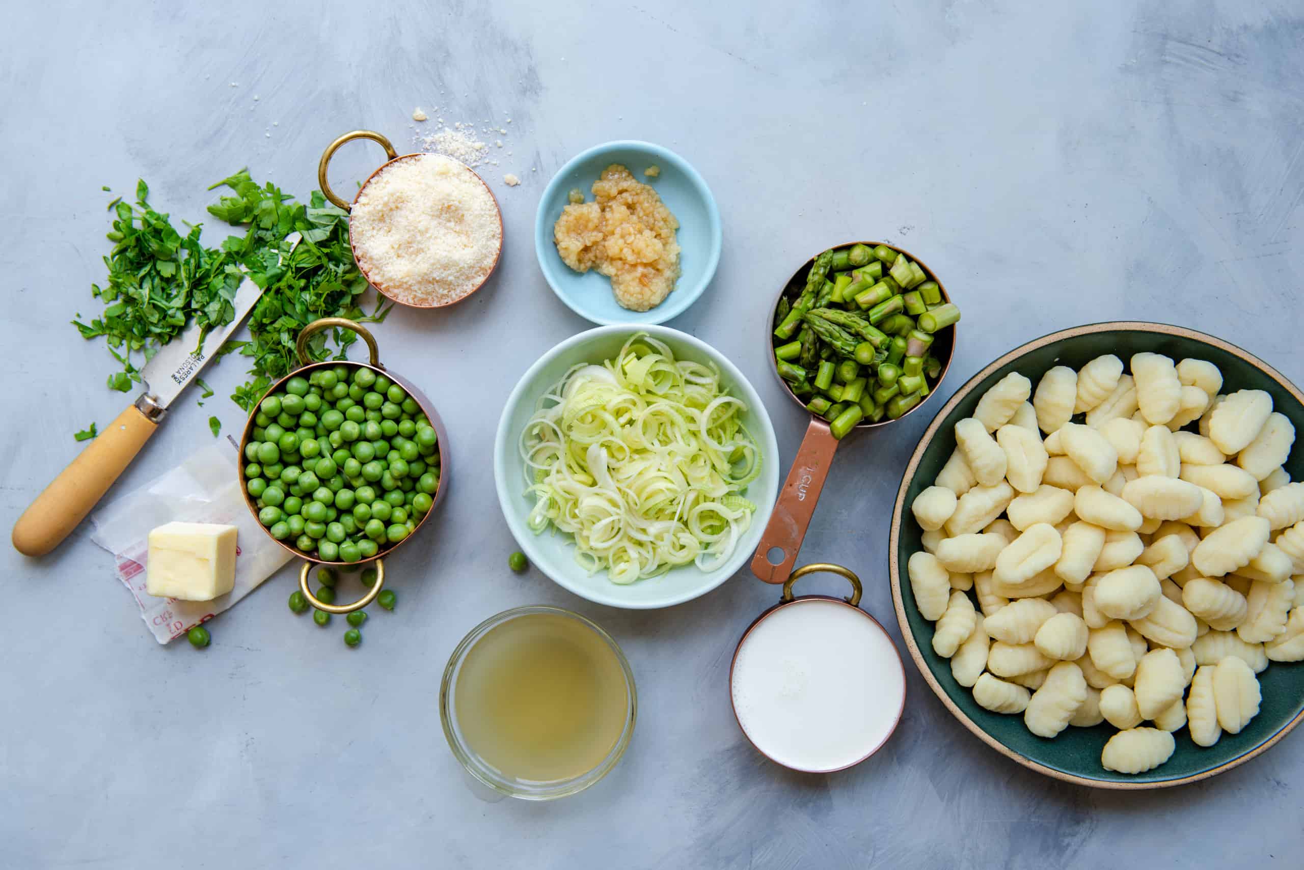 Overhead view of ingredients for Cheesy Gnocchi.