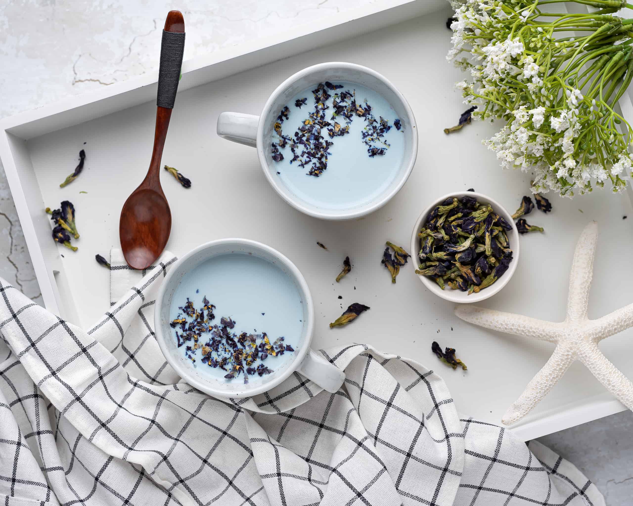 Overhead view of 2 cups of Blue Moon Milk with Sensoril Ashwagandha Supplement.