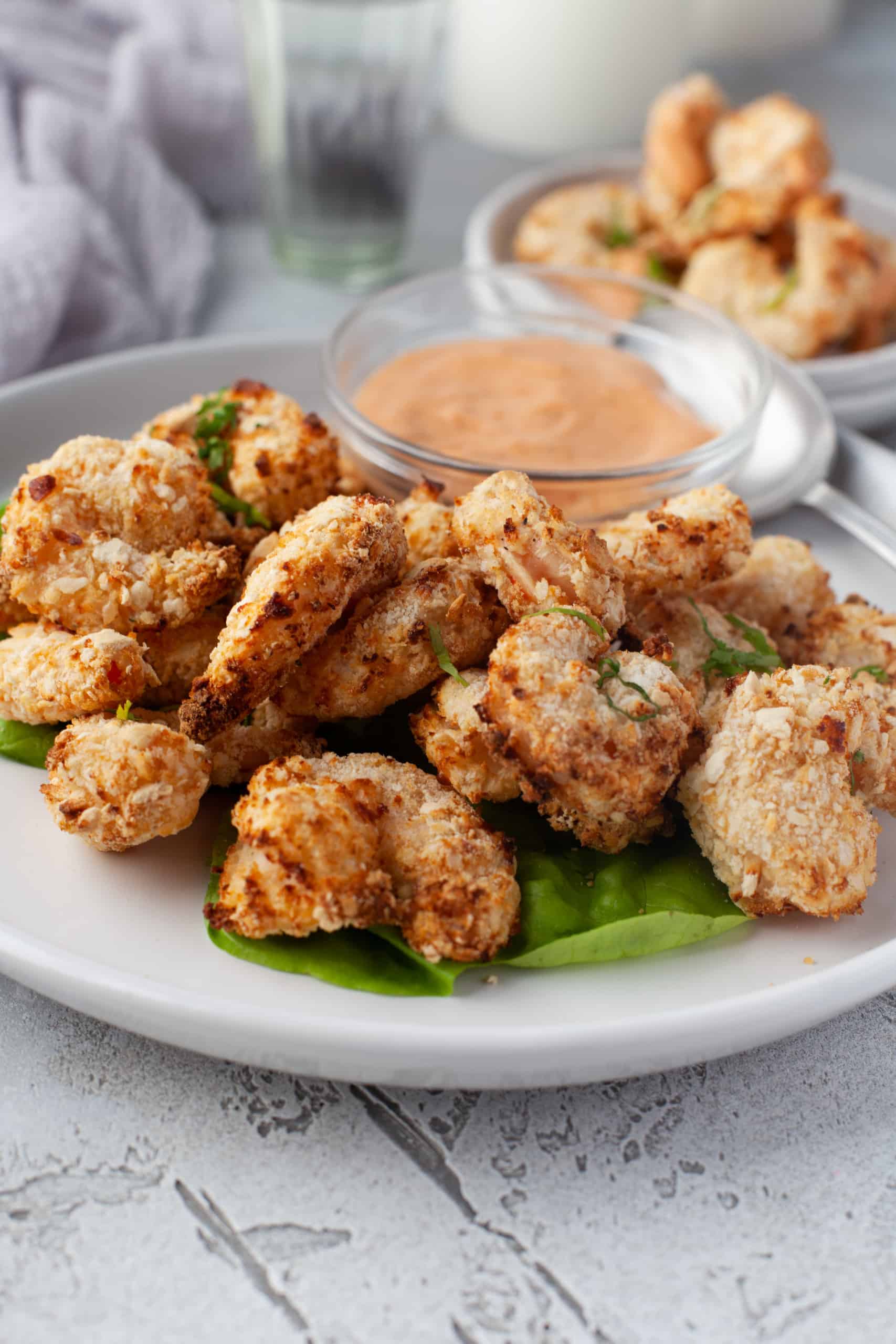 Fried Shrimp with Chipotle Sauce on a white plate.