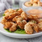 Fried Shrimp with sauce on a white plate.
