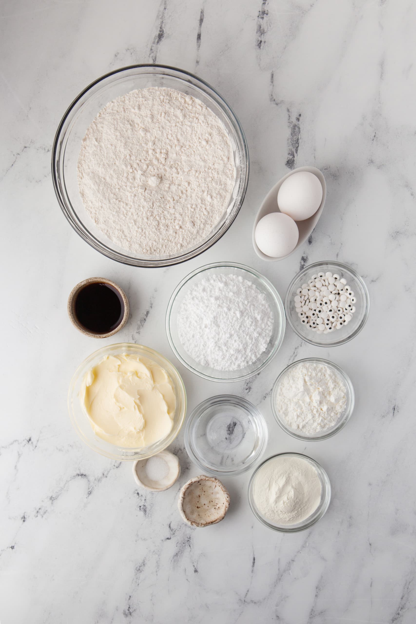 Overhead view of ingredients for Mummy Cookies with Royal Icing.