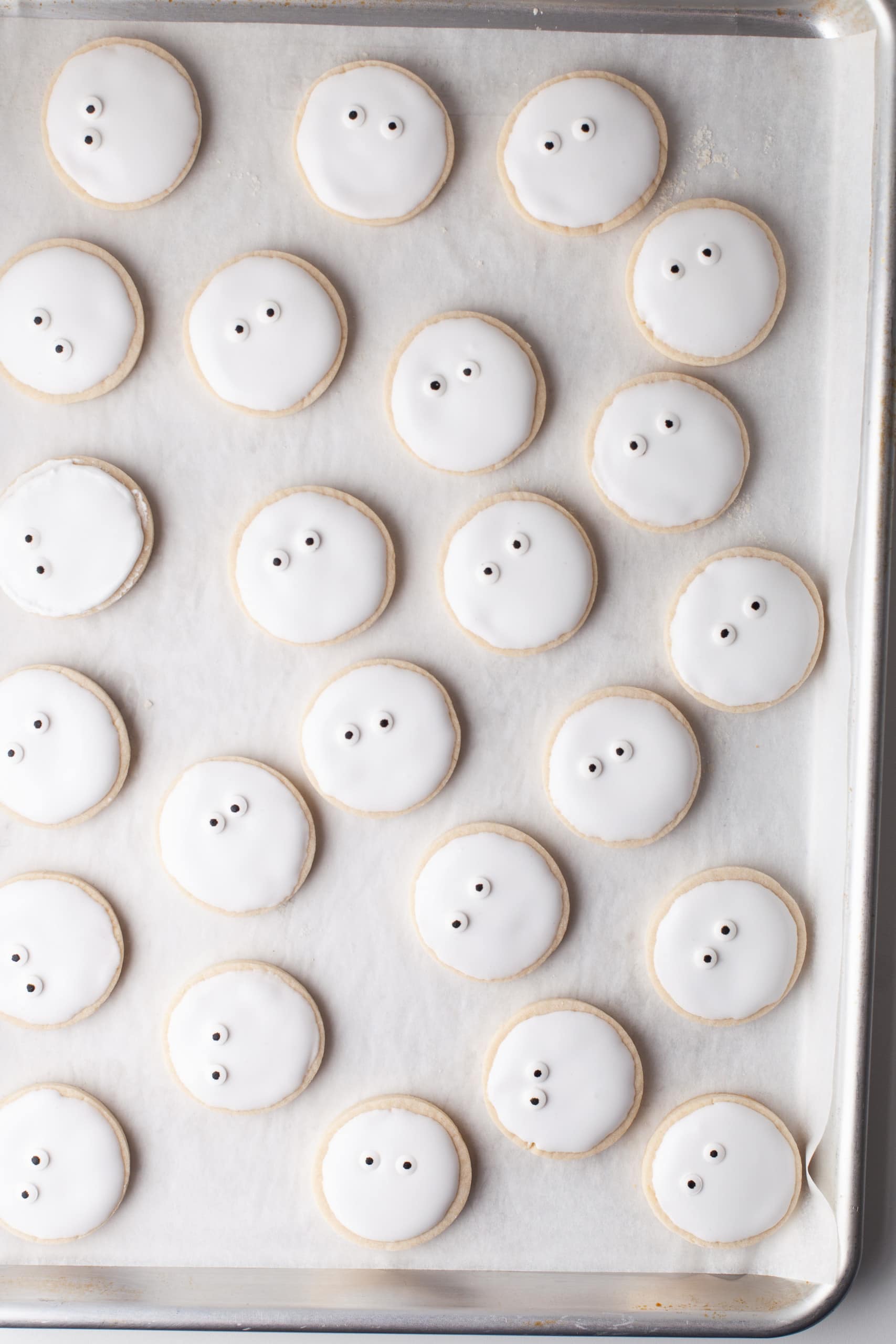 Overhead view of cookies with candy eyes.