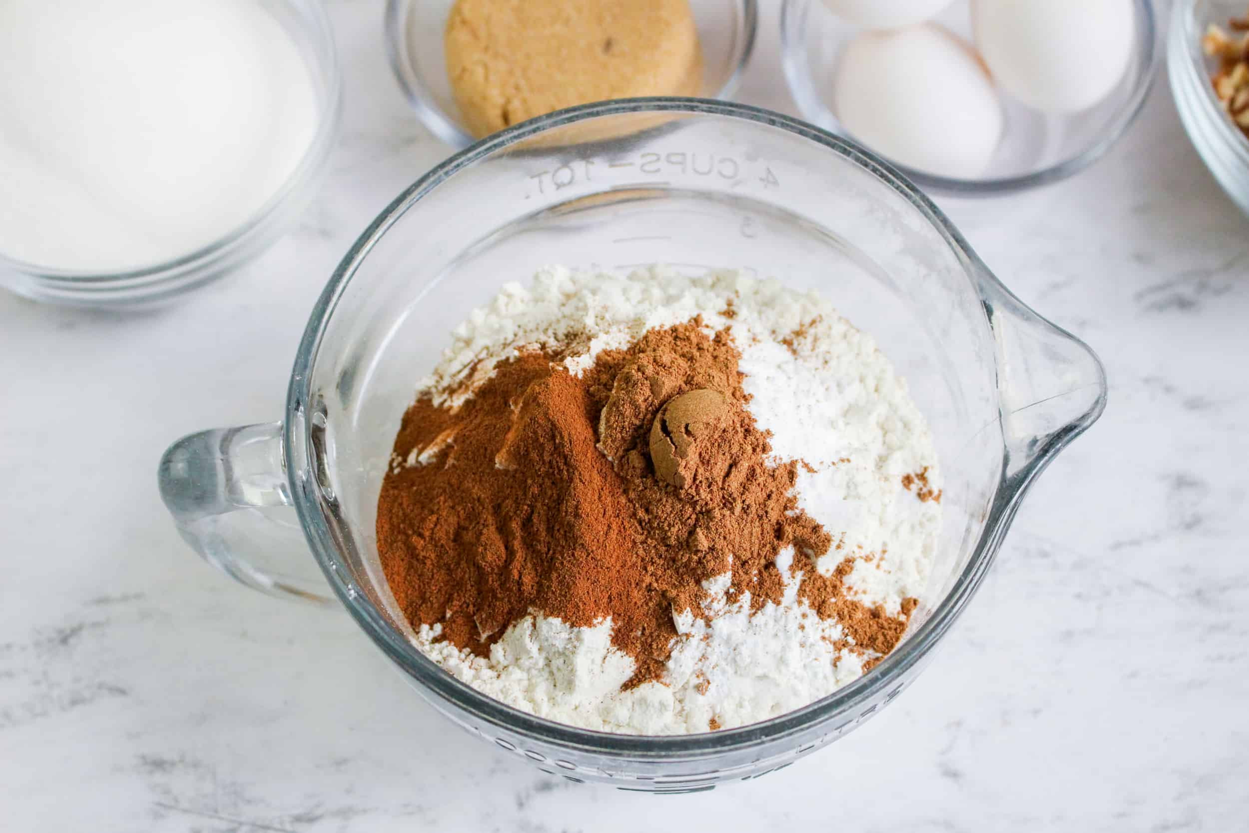 Overhead view of pumpkin banana bread dry ingredients.