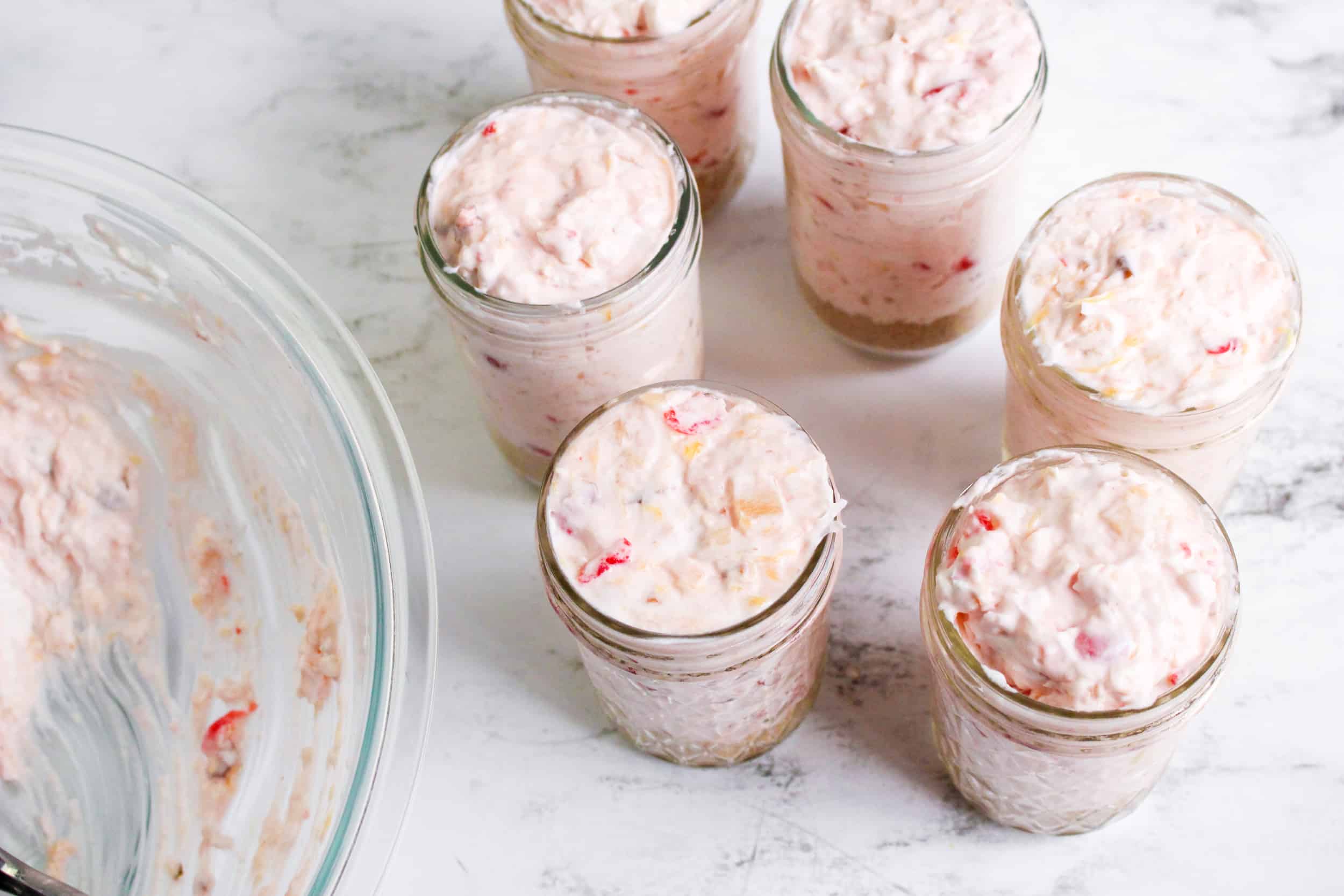 Millionaire Pie Filling added to Mason jars.