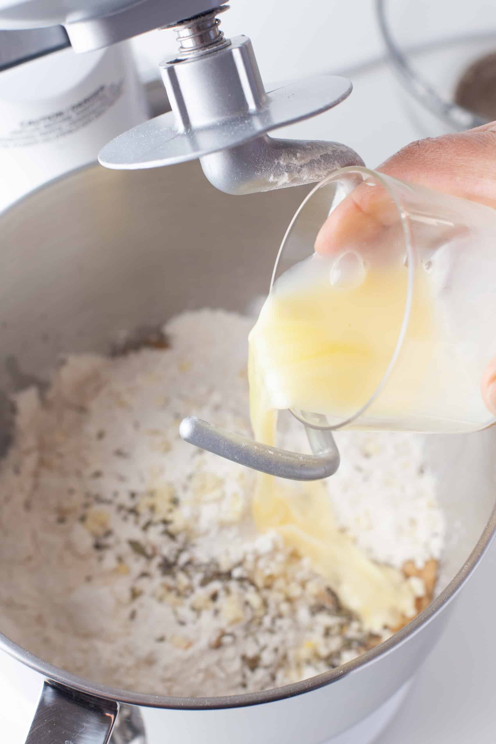 Mixing garlic roll dough.