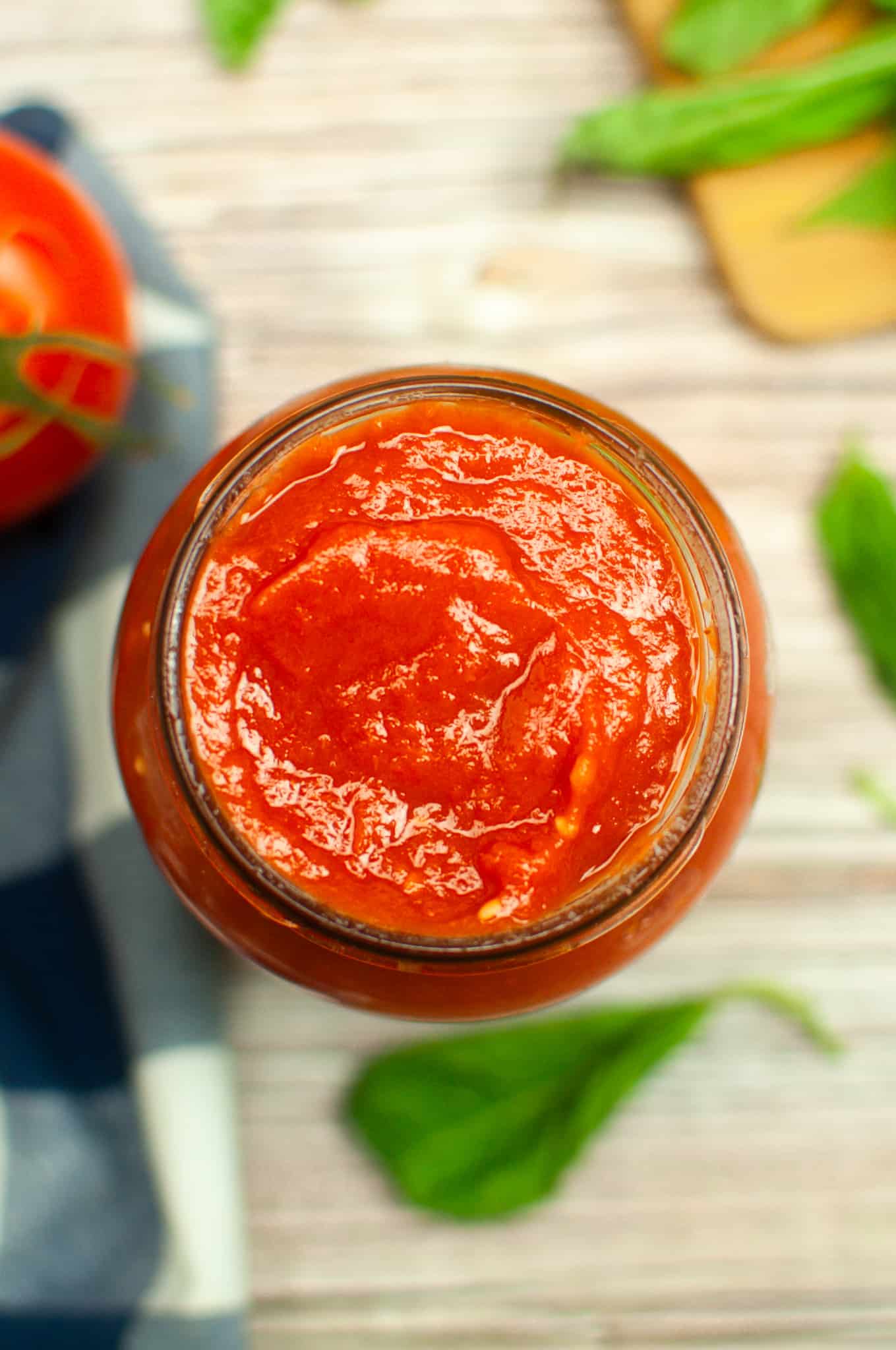 Overhead view of sauce in jar.