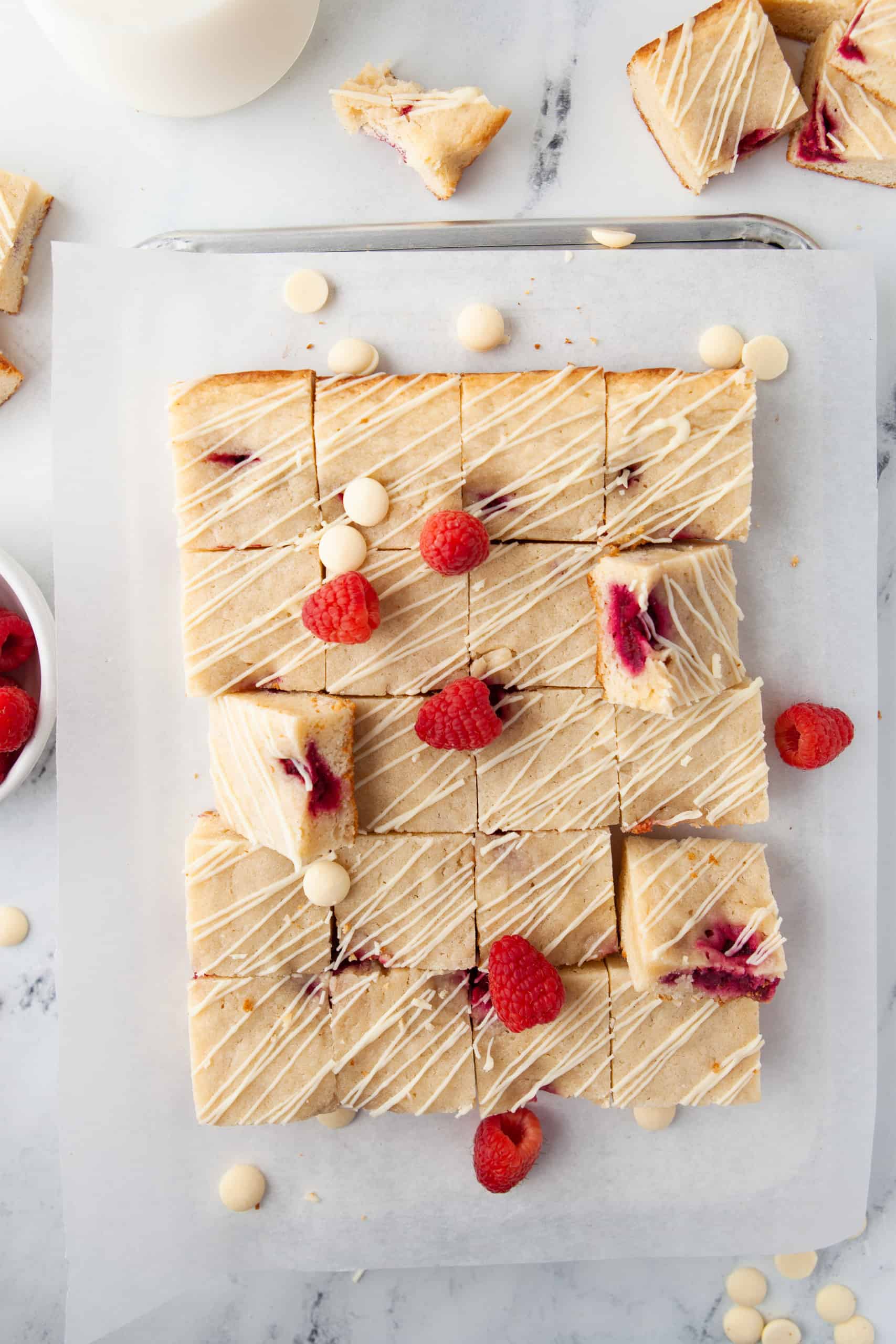 Overhead view of rwhite chocolate raspberry blondies.