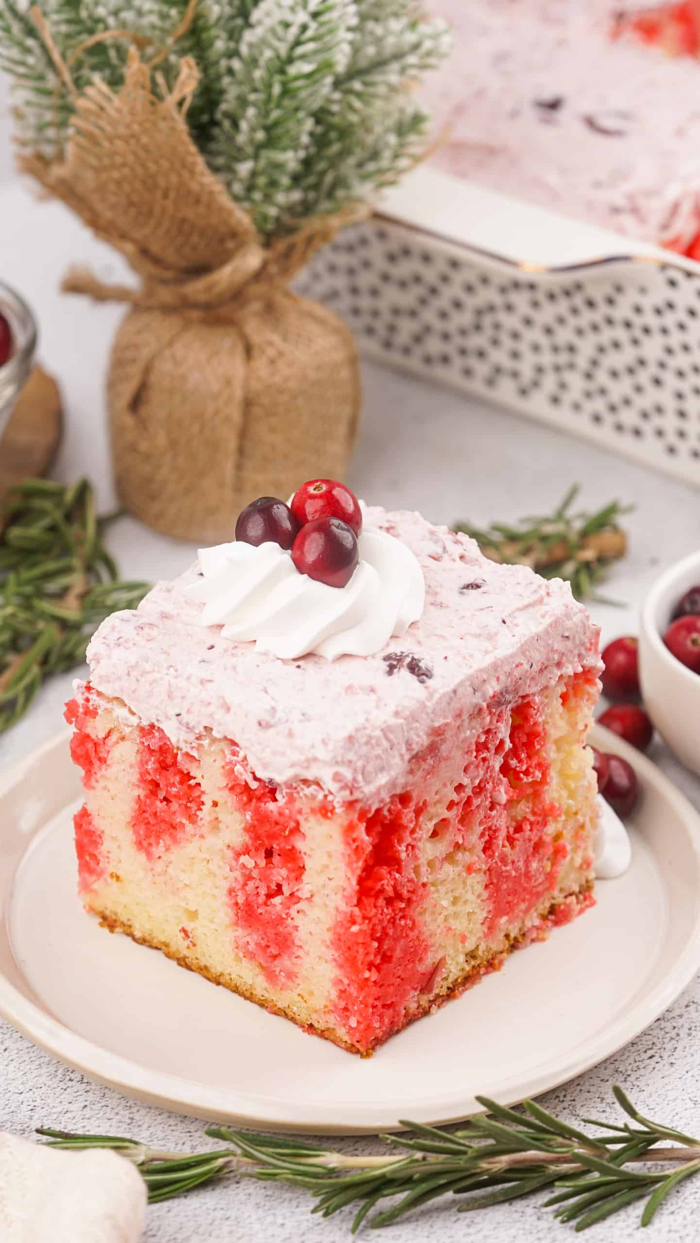 Slice of Cranberry Poke Cake.