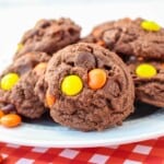 Chocolate Cookies wit Reeses Pieces candies in them.