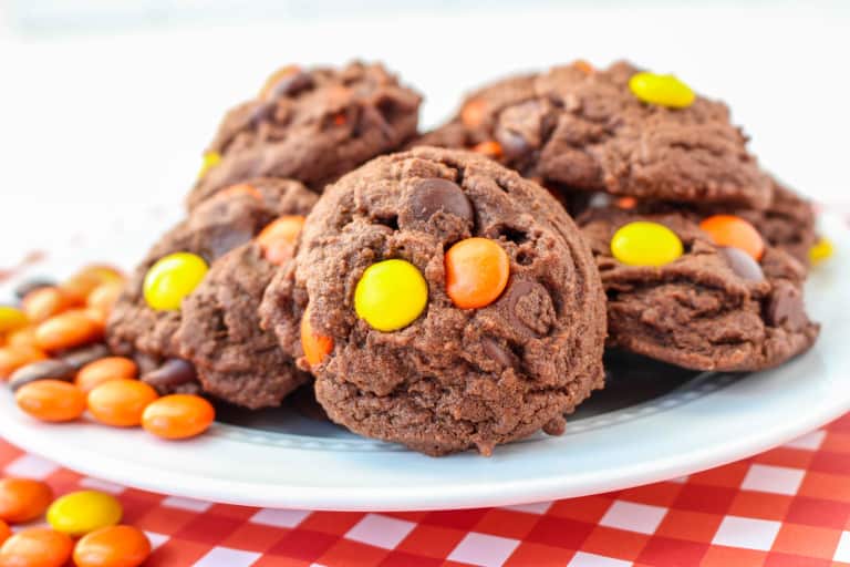 Chocolate Cookies wit Reeses Pieces candies in them.