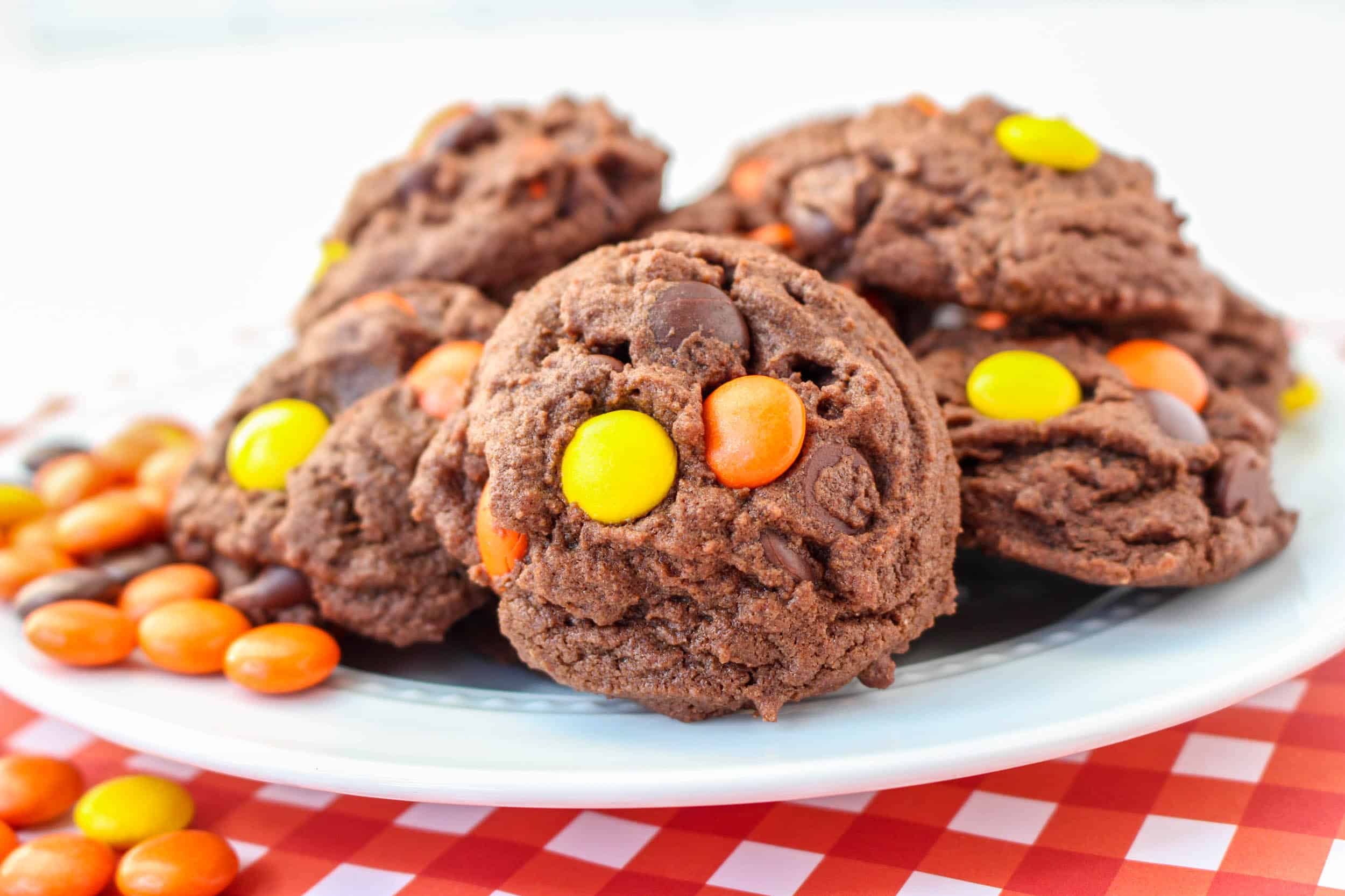 Chocolate Cookies wit Reeses Pieces candies in them.