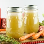2 Mason jars filled with turkey broth.