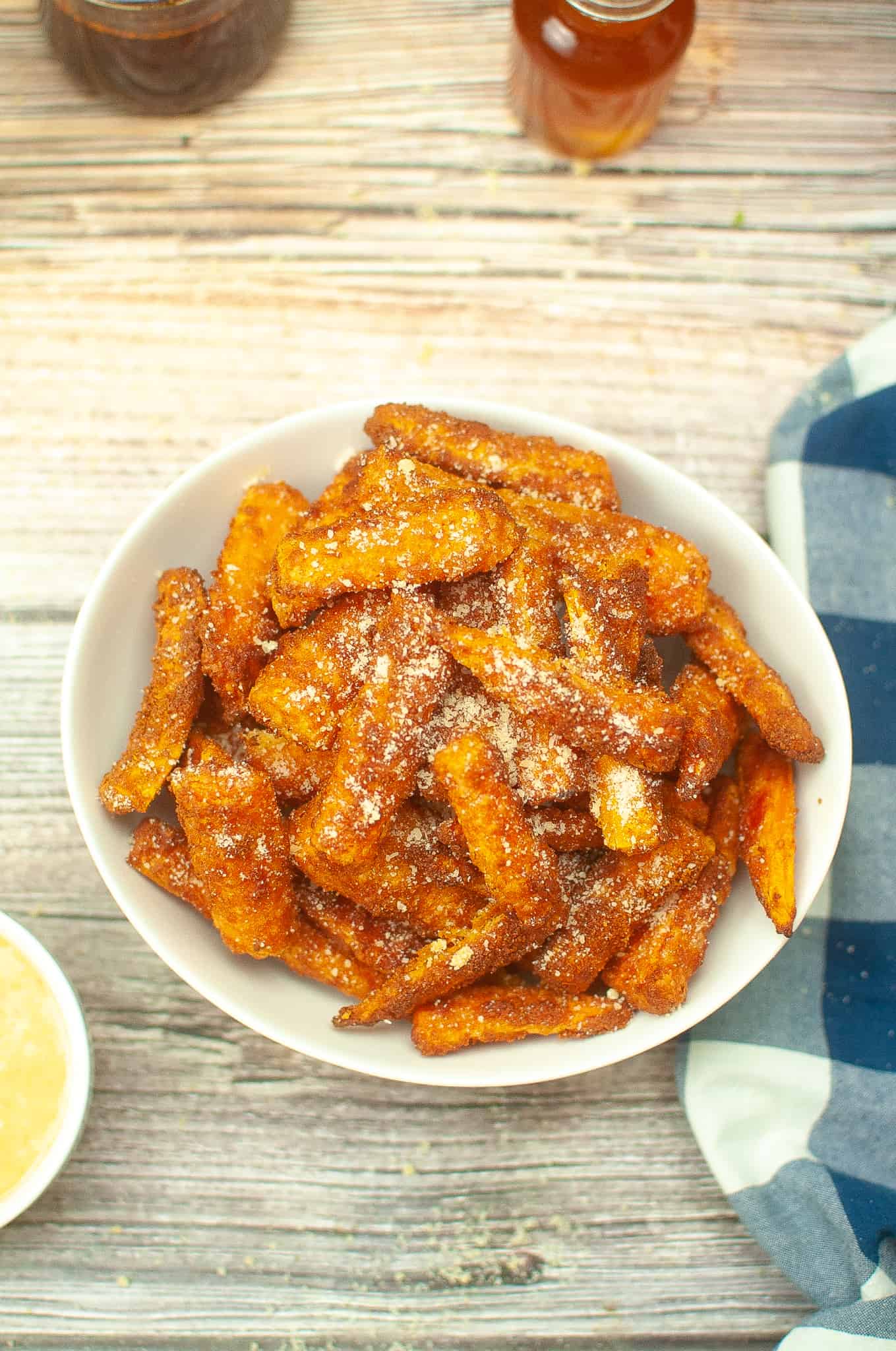 Overhead view of air fryer carrots.