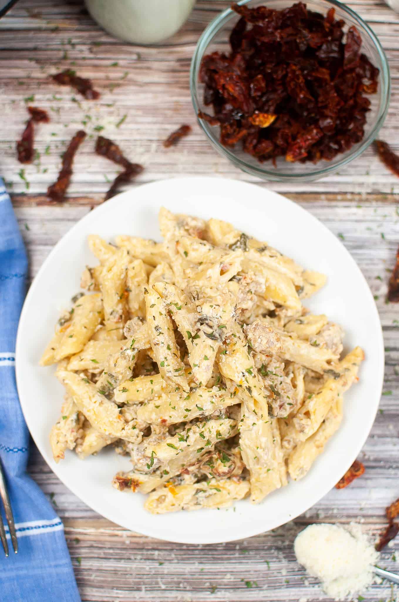 Overhead view of penne pastgnwith sausage.