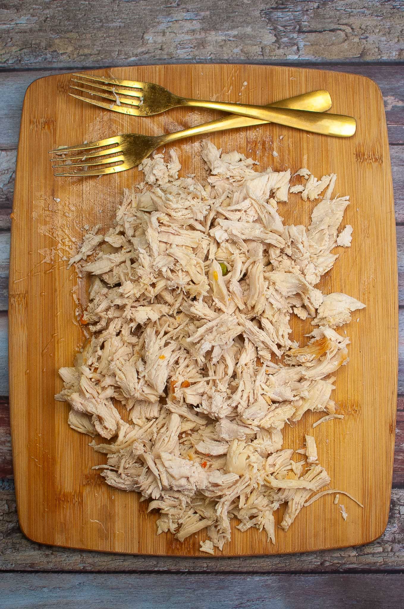 Overhead view of shredded chicken.