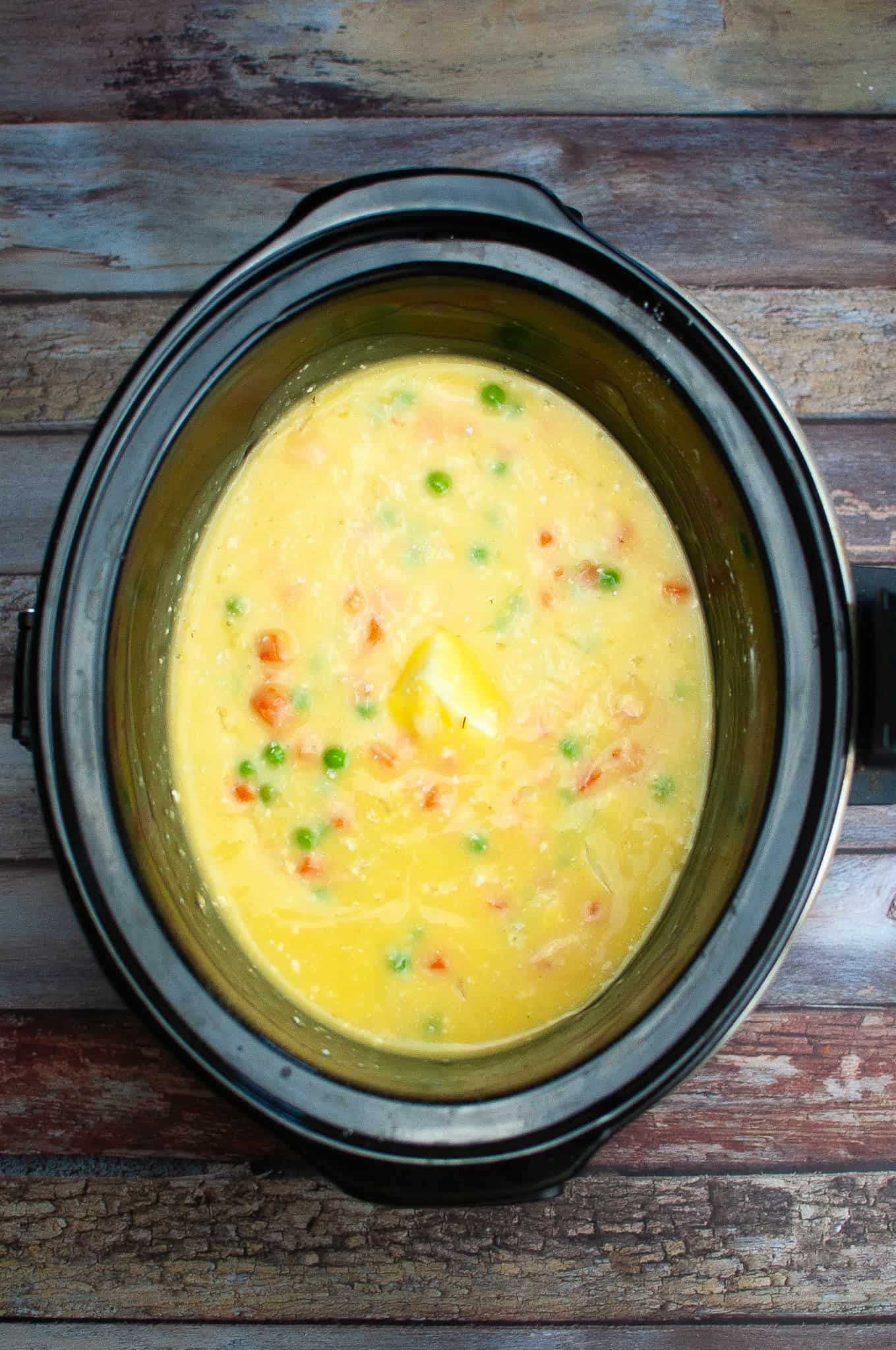 Overhead view of slow cooker chicken and dumplings.