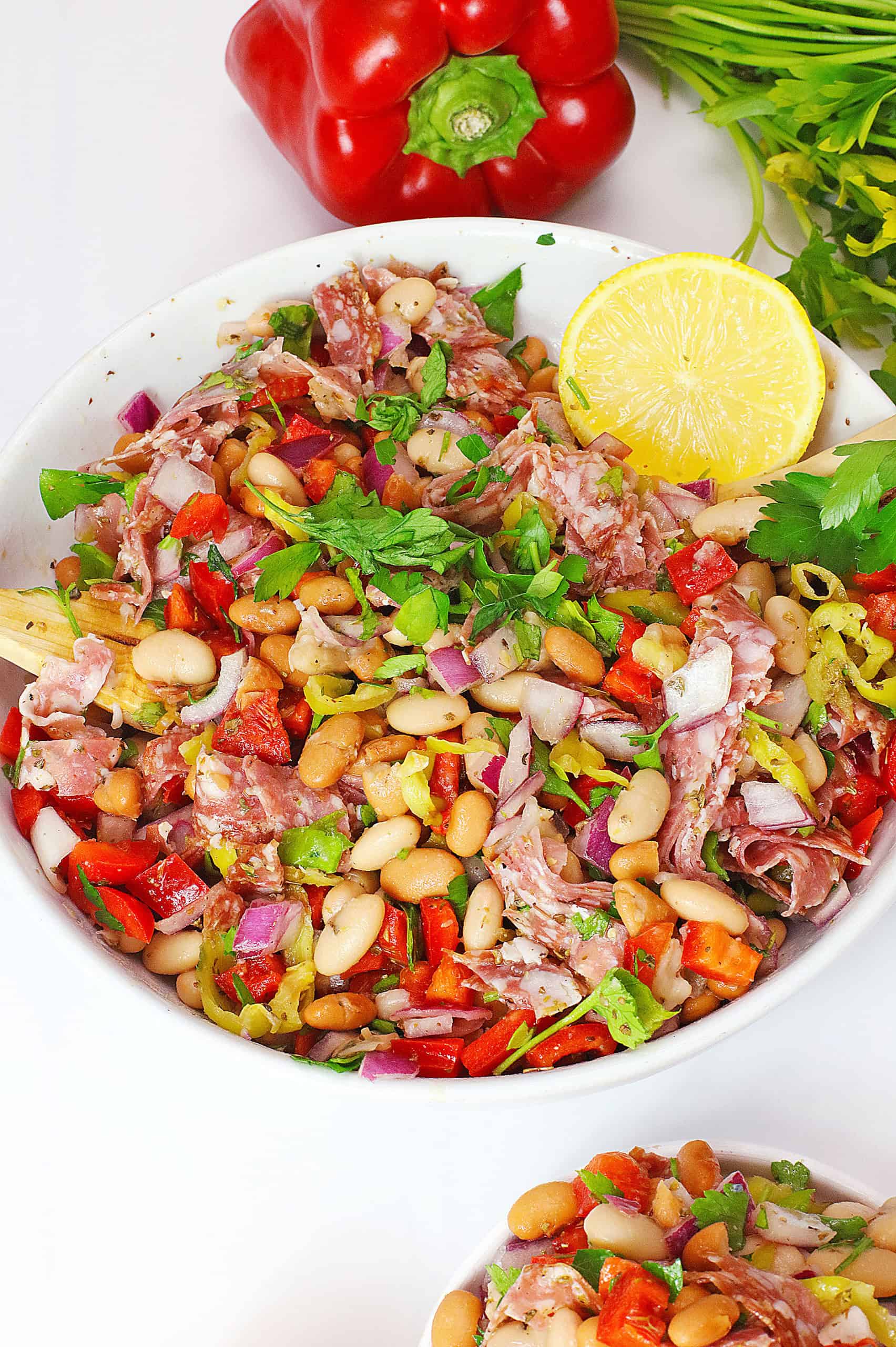 Overhead view grinder white bean salad.