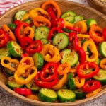 Pepper Cucumber Salad in a wooden serving bowl.