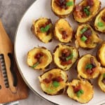 Overhead view of bacon cheese potato skins.