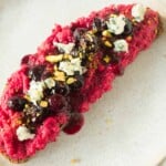 Overhead view of toast with beet hummus.