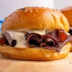 Head-on photo of air fryer swiss beef sandwiches.