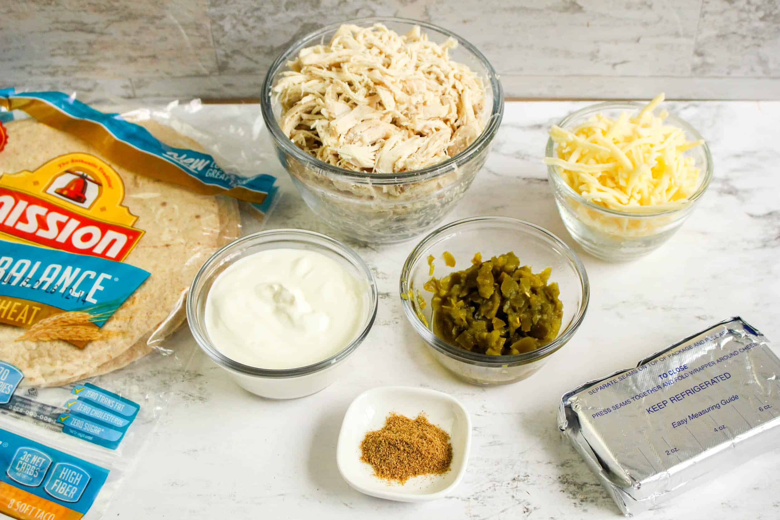 Ingredients for air fryer chicken jalapeño taquitos.