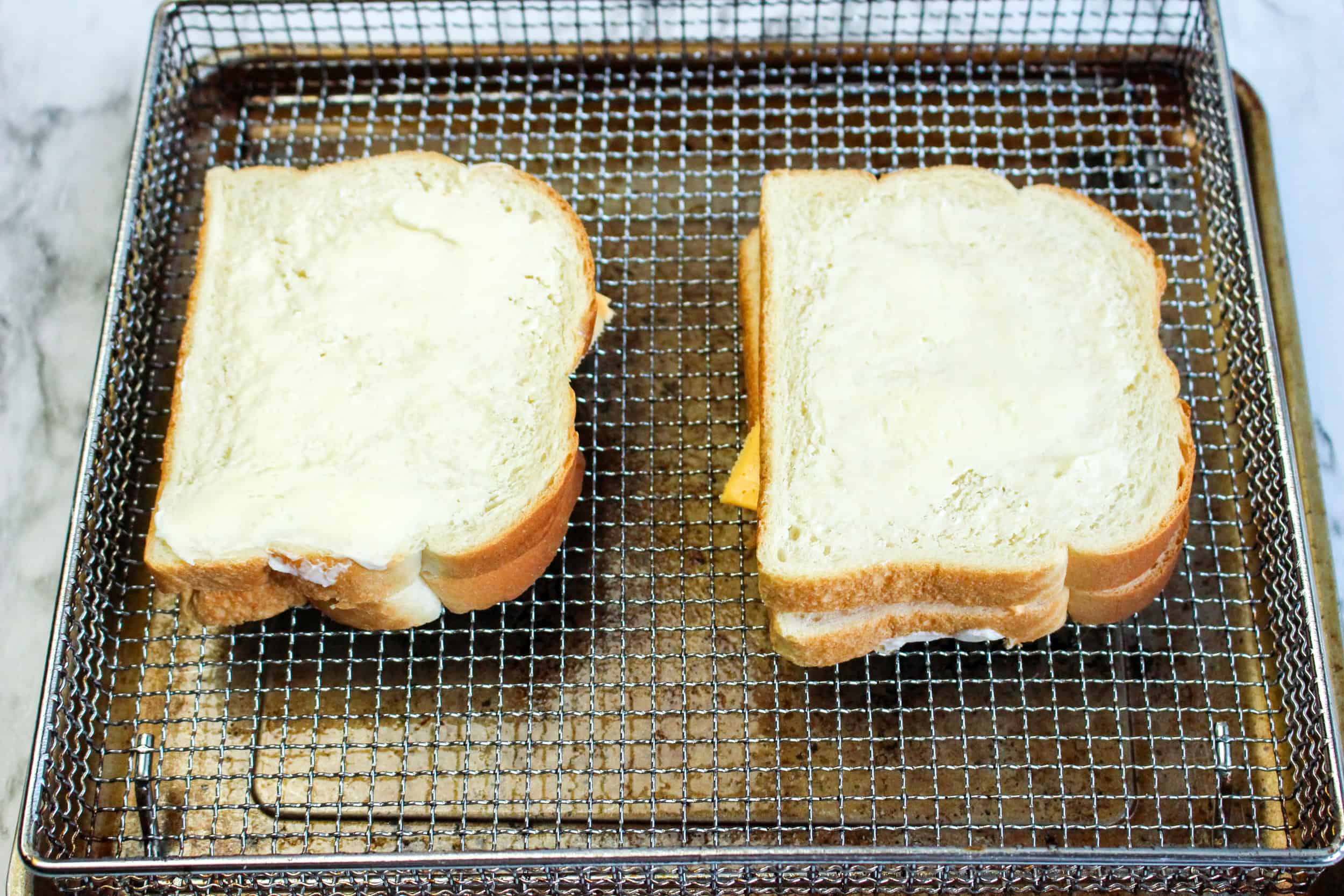 Buttered bread cheese sandwiches.
