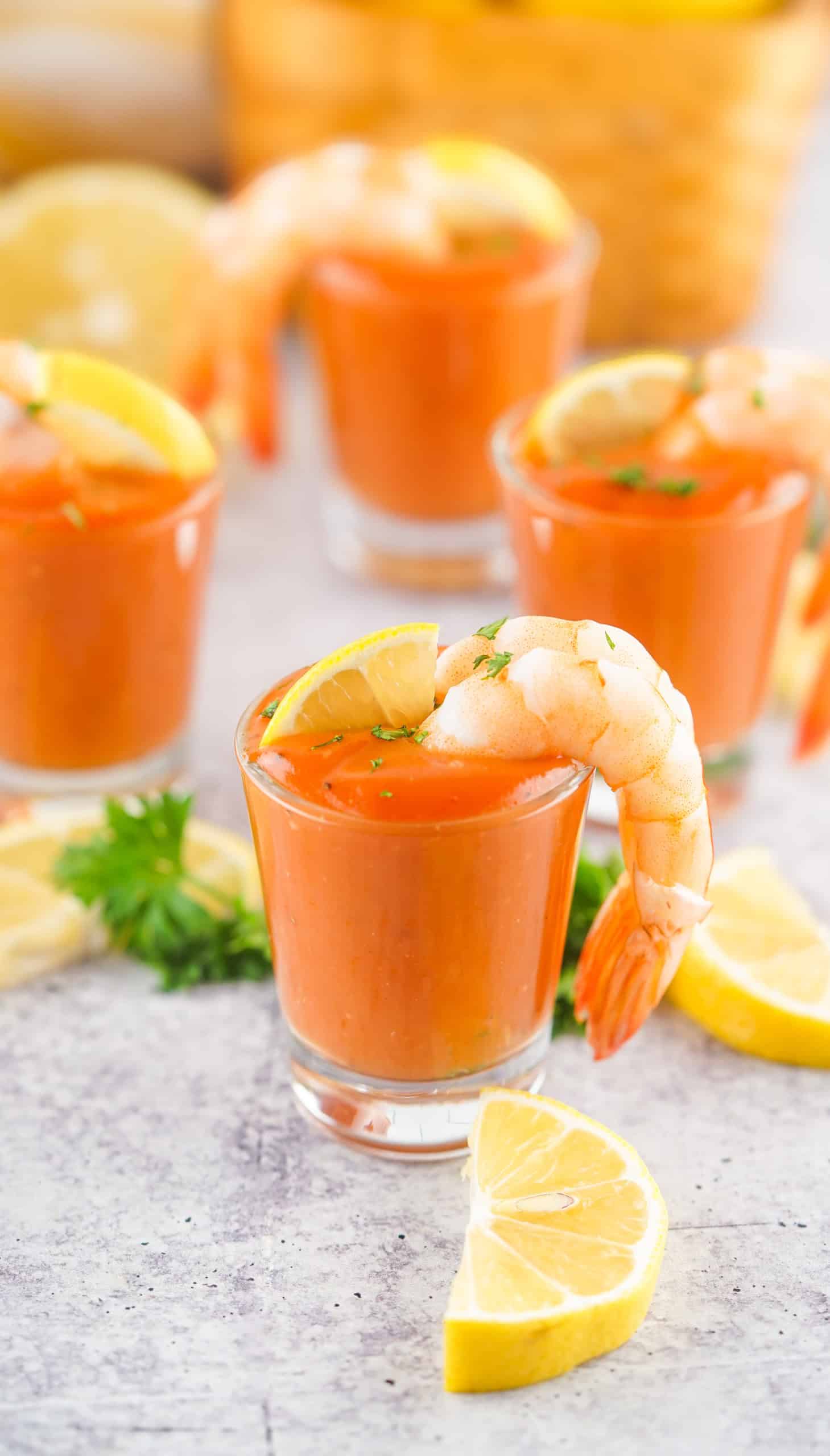 Headon photo of shrimp cocktail shooters.