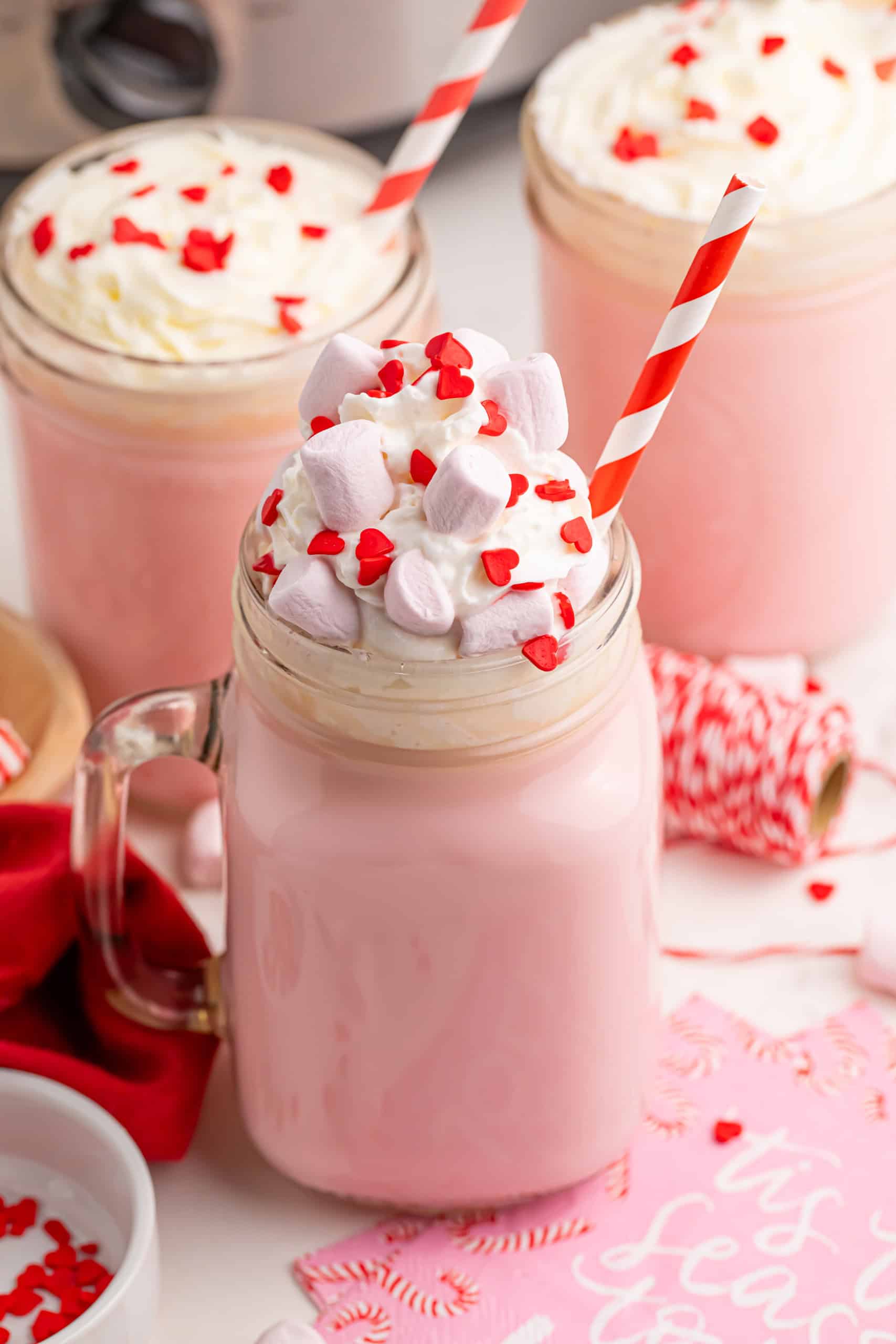 Overhead view of slow cooker pink hot chocolate.