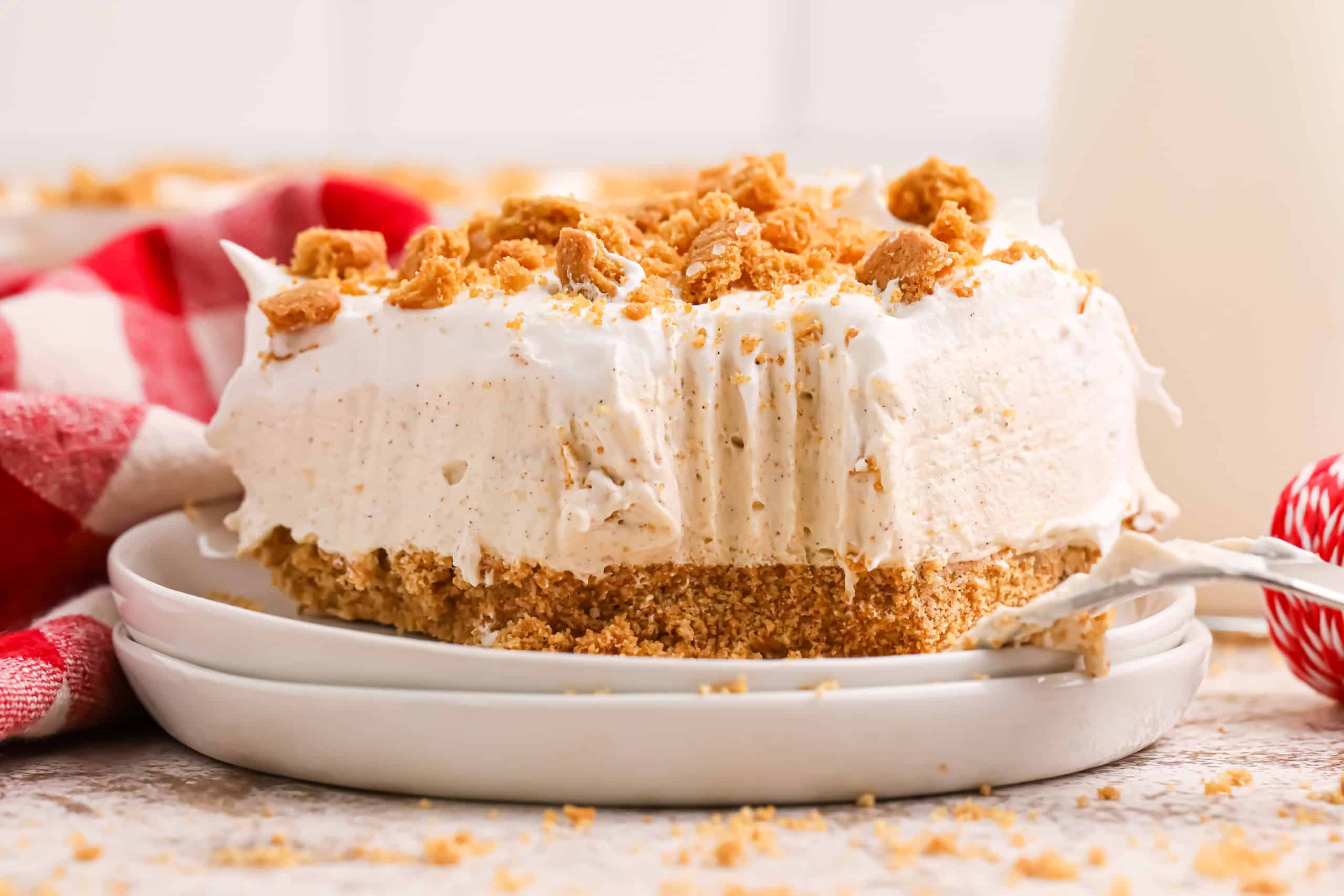 Headon view of Christmas gingerbread lush with a bite out of it.