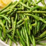 Air fryer green beans on a plate.