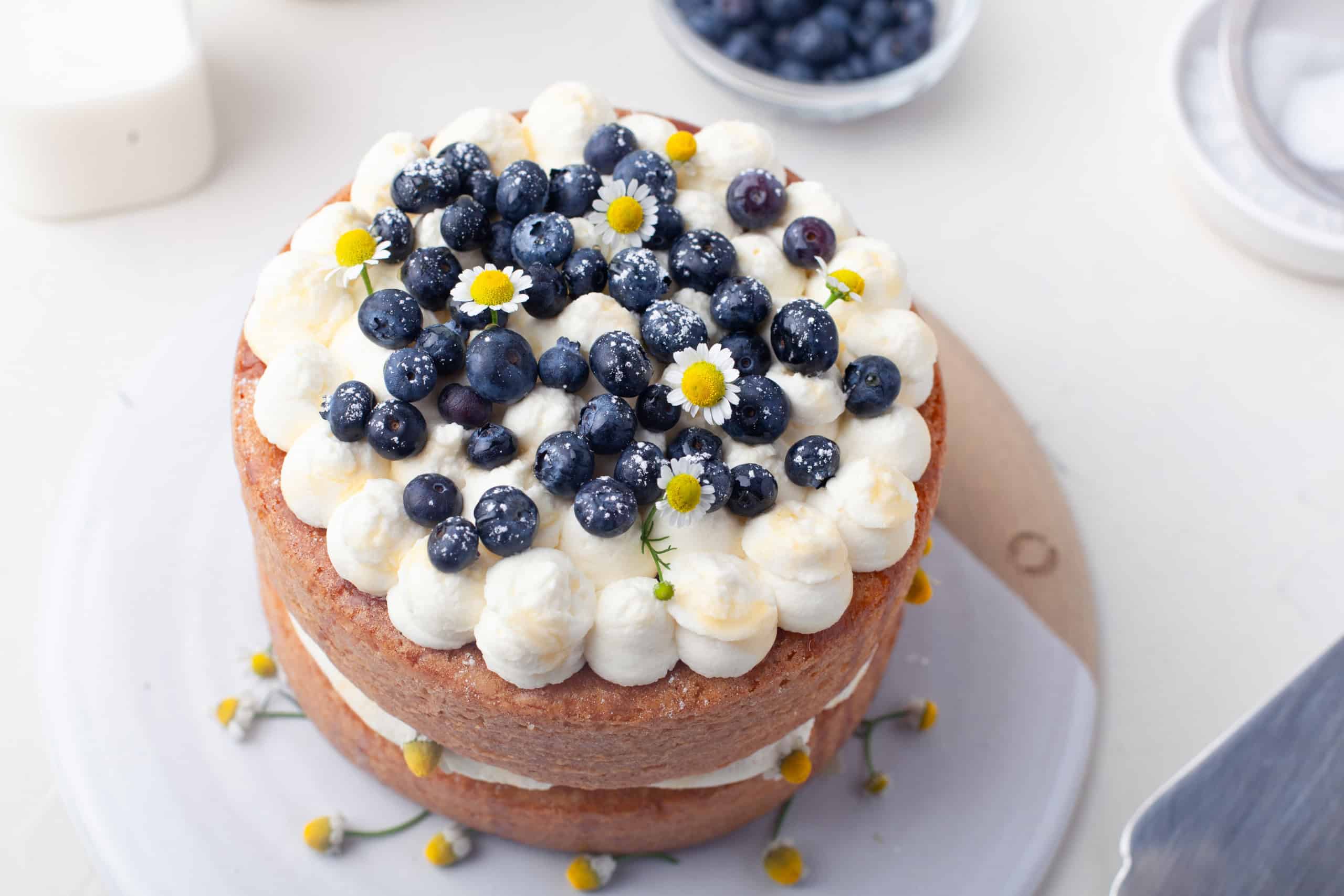 Overhead view of blueberry honey chamomile cake.