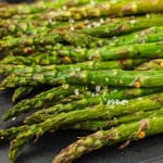 Closeup of air fryer asparagus.