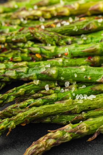 Closeup of air fryer asparagus.