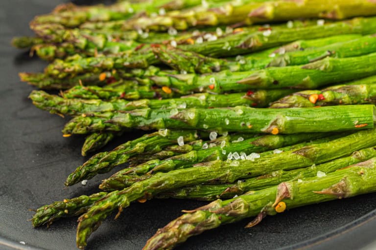 Closeup of air fryer asparagus.