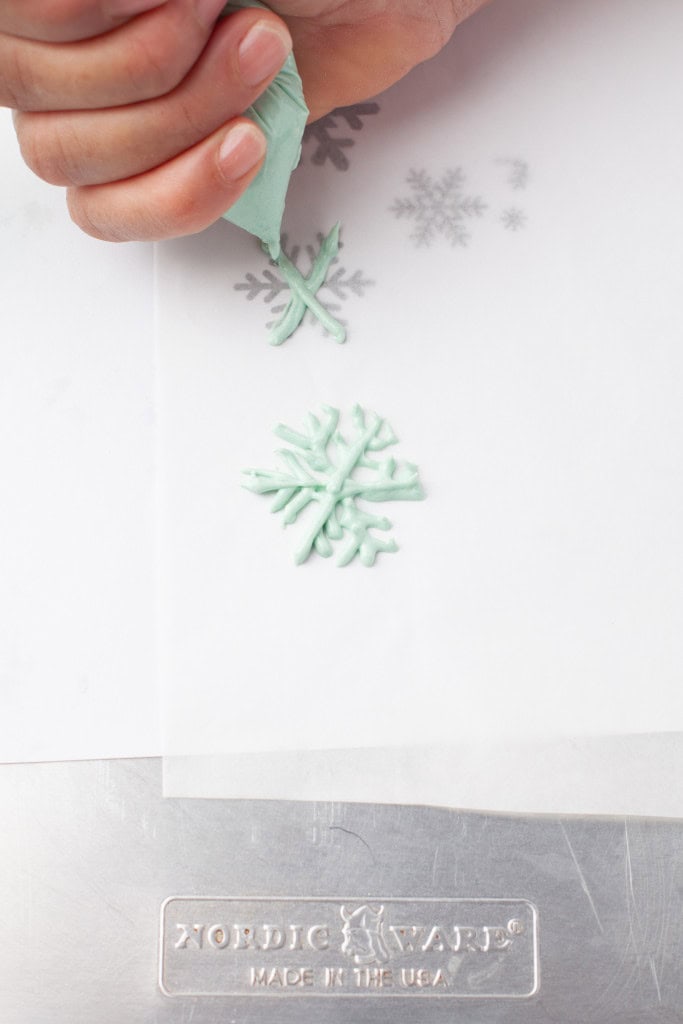 making chocolate snowflakes.